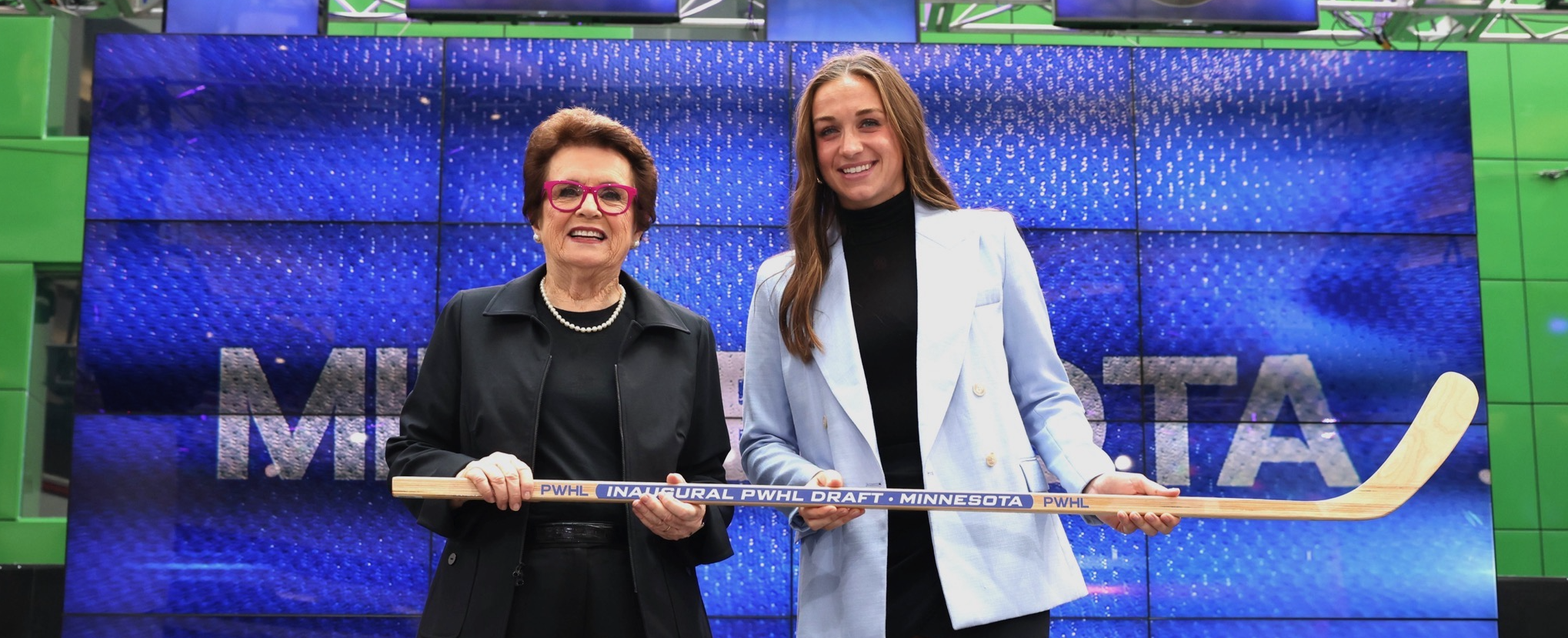 Billie Jean King and Taylor Heise pose for a photo at the 2023 PWHL draft after Heise was selected first overall.