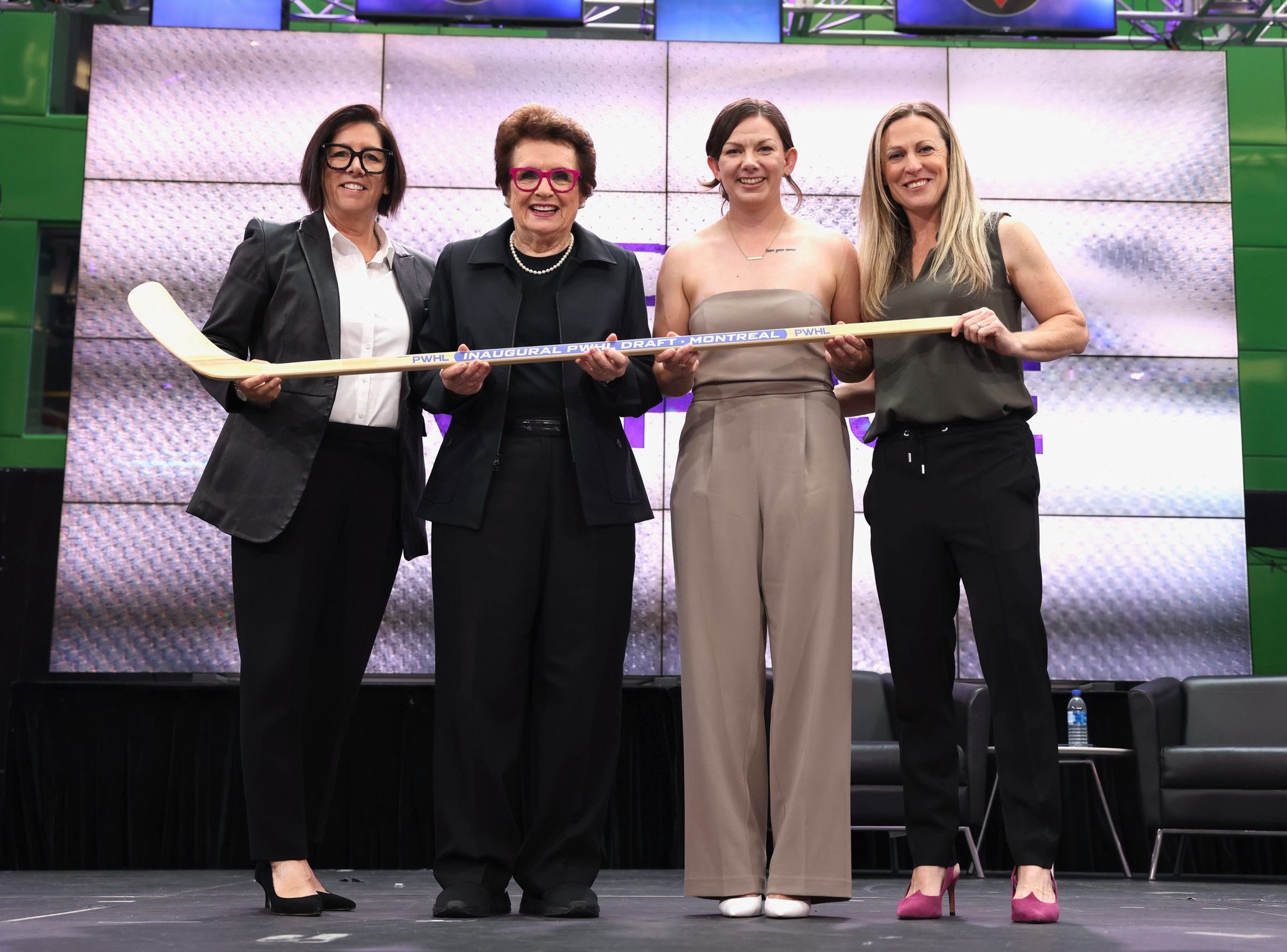 Danièle Sauvageau, Billie Jean King, Erin Ambrose, and Jayna Hefford pose at the PWHL Draft.
