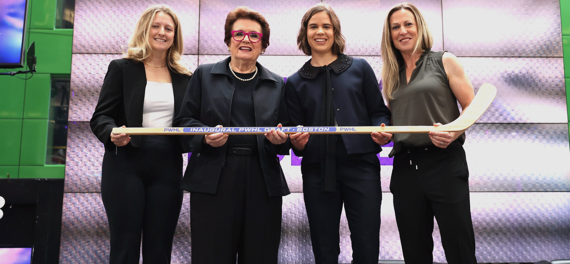 Danielle Marmer, Billie Jean King, Alina Müller, and Jayna Hefford pose at the PWHL draft.